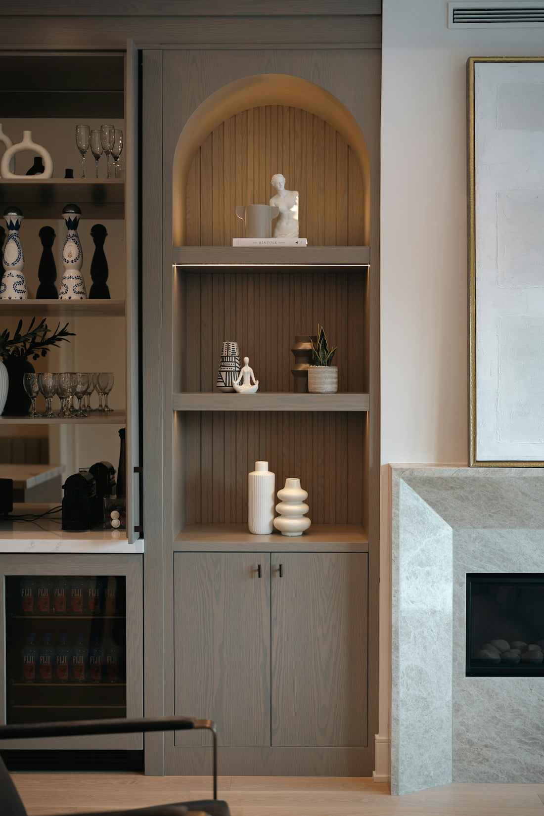 Modern built-in shelving unit with decorative items