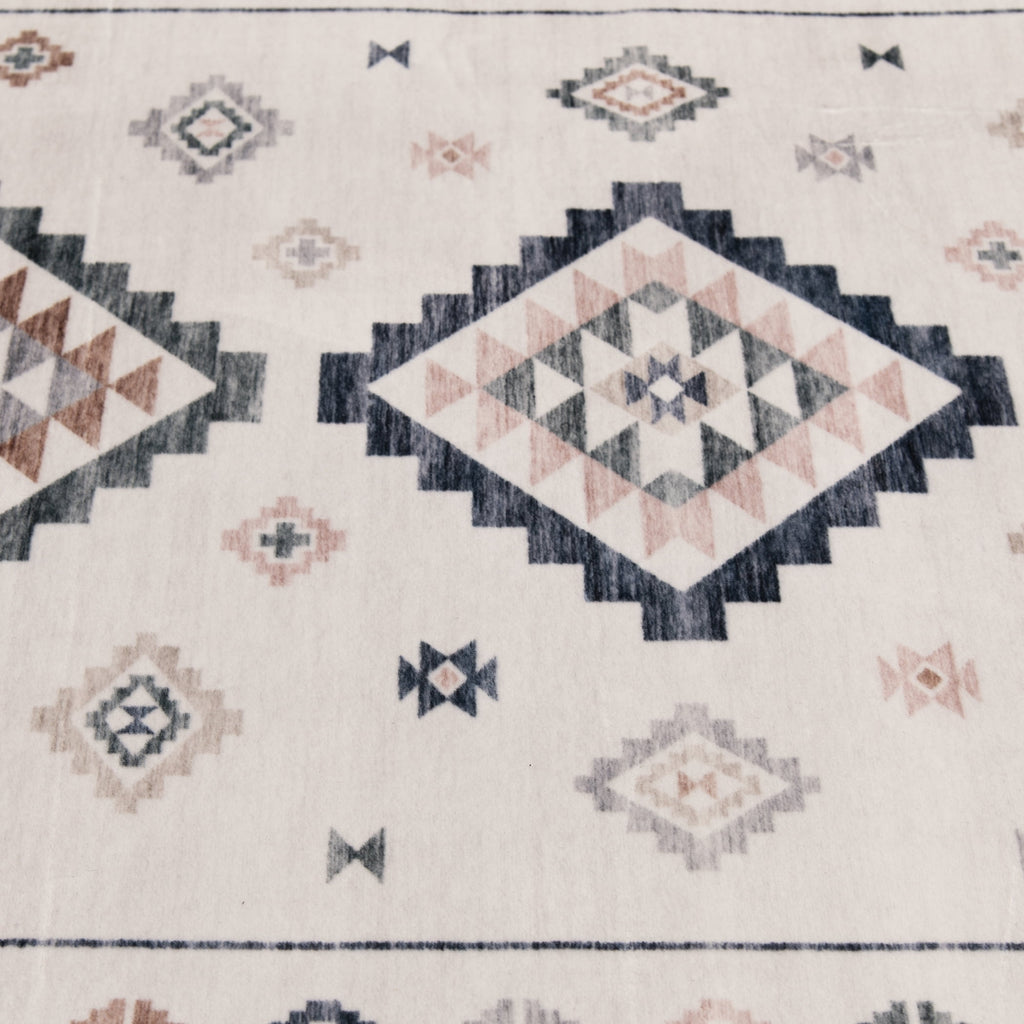 Velmora™ 4 ft x 5 ft 6 in Southwestern Faux Fur Indoor Area Rug