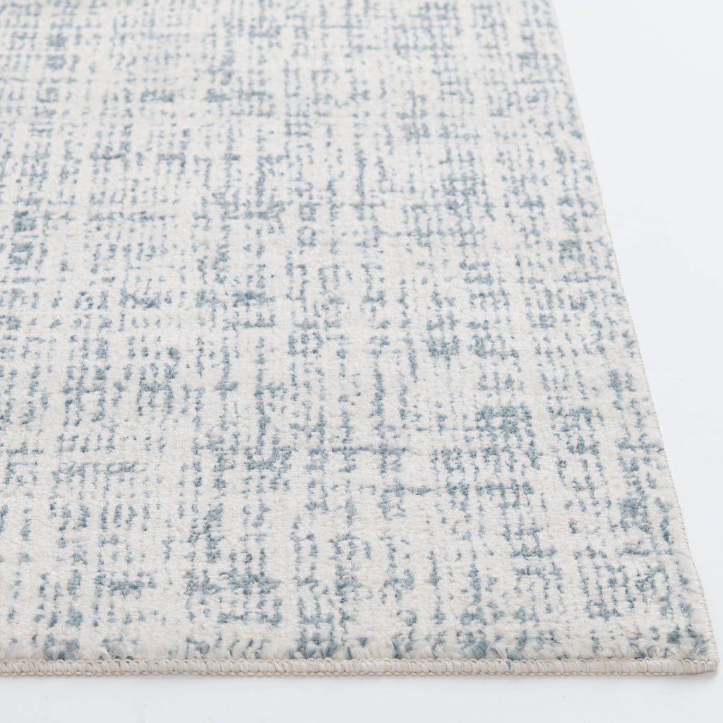 Velmora™ 7 ft 6 in x 9 ft 6 in Ivory and Blue Plaid Indoor Area Rug