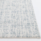 Velmora™ 7 ft 6 in x 9 ft 6 in Ivory and Blue Plaid Indoor Area Rug