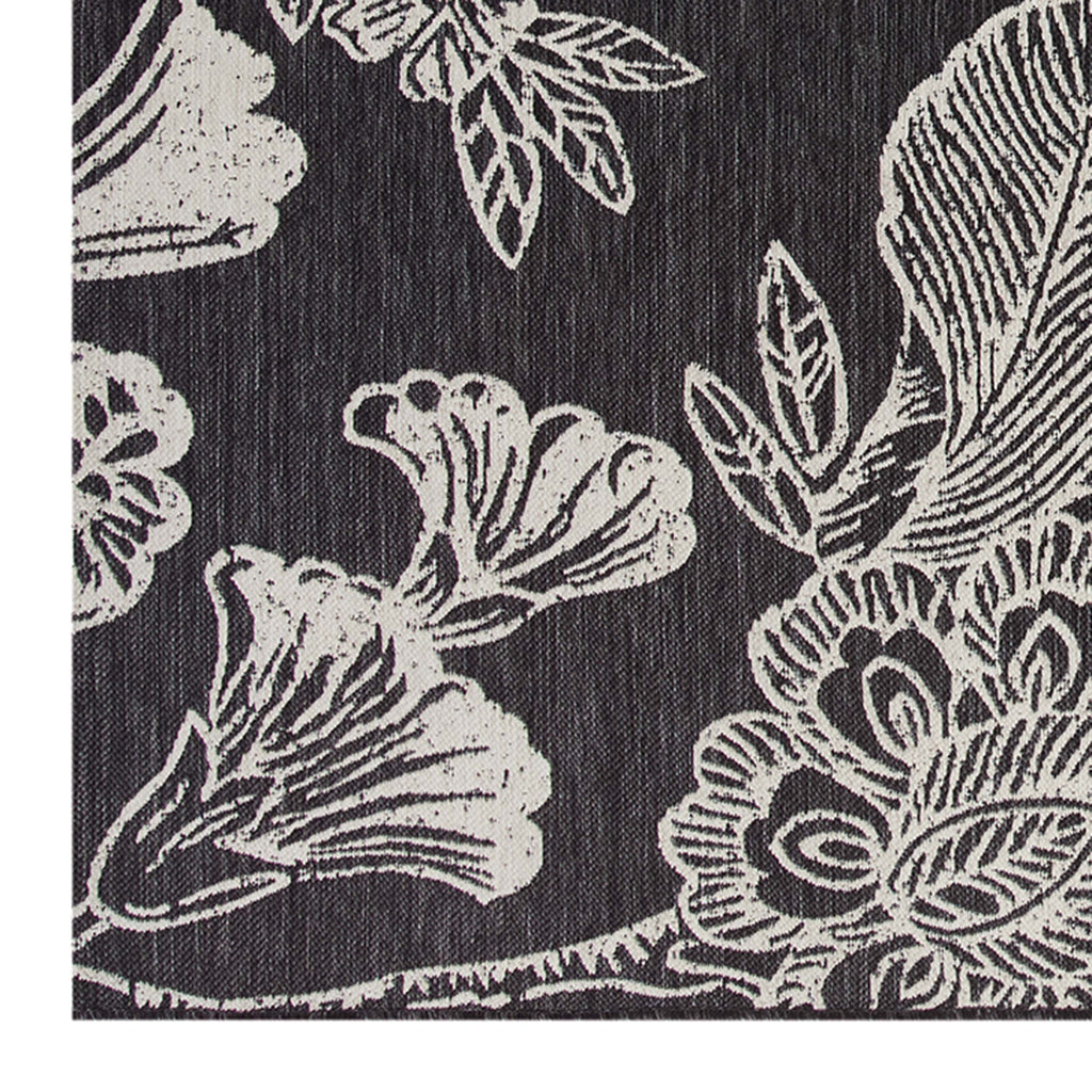 Velmora™ 7' x 10' Black & White Floral Outdoor Rug