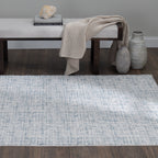 Velmora™ 7 ft 6 in x 9 ft 6 in Ivory and Blue Plaid Indoor Area Rug