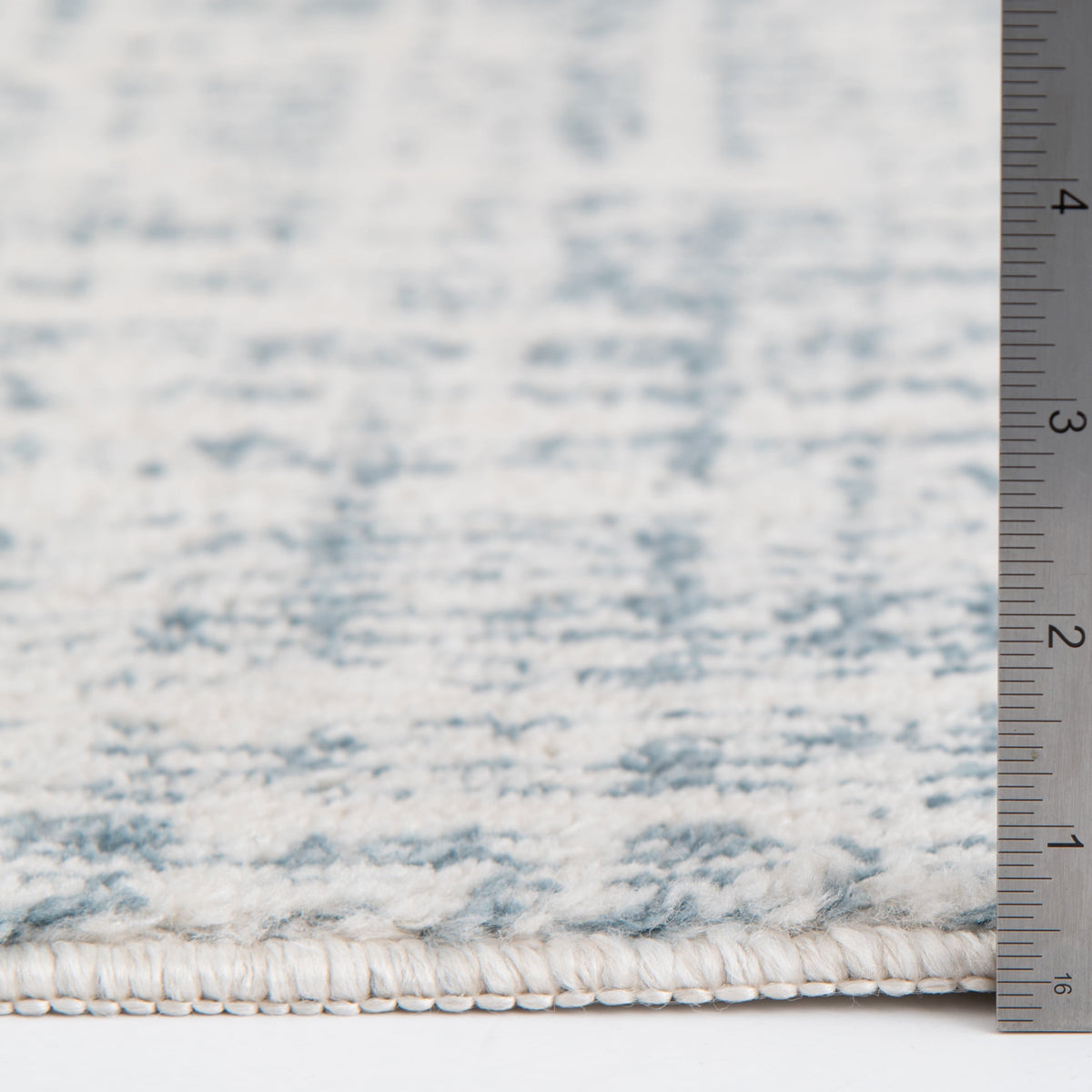 Velmora™ 7 ft 6 in x 9 ft 6 in Ivory and Blue Plaid Indoor Area Rug