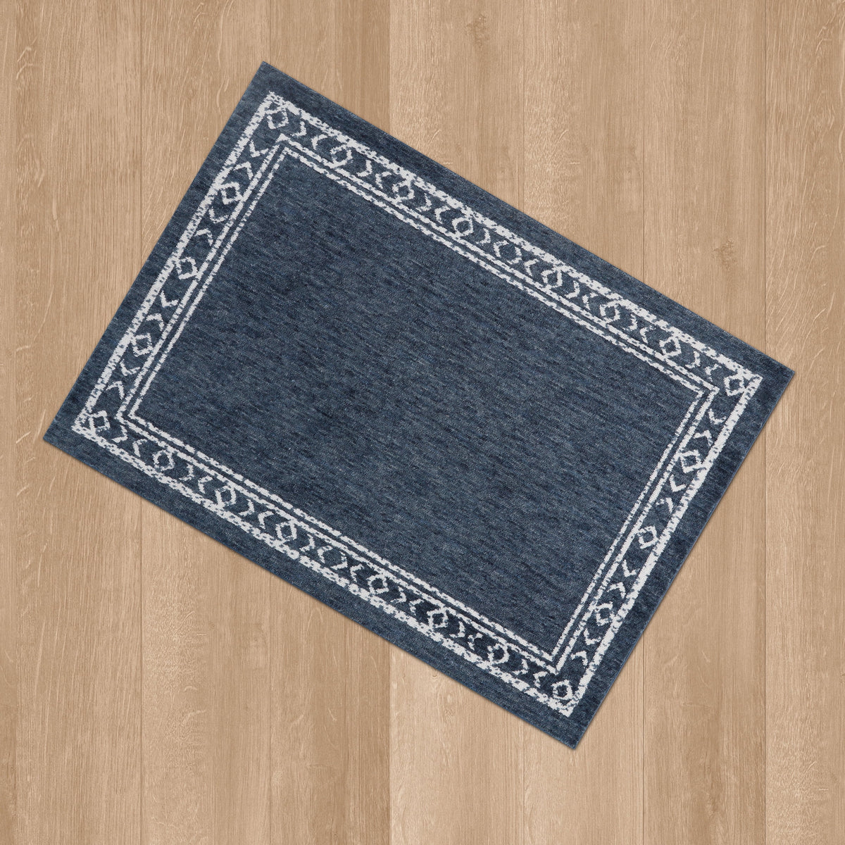 Velmora™ Washed Indigo Bordered Tufted Washable Area Rug, 5 ft x 7 ft