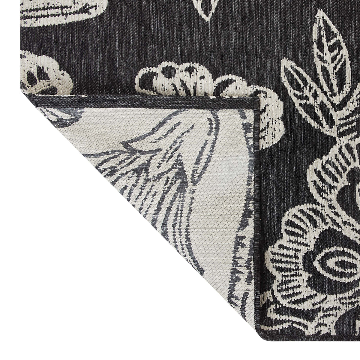 Velmora™ 7' x 10' Black & White Floral Outdoor Rug